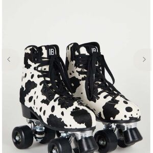 INTENTIONALLY BLANK Cow Print Roller Skates